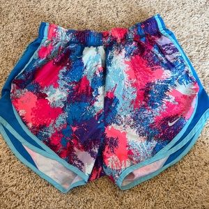 Multi-Colored Nike Tempo shorts.